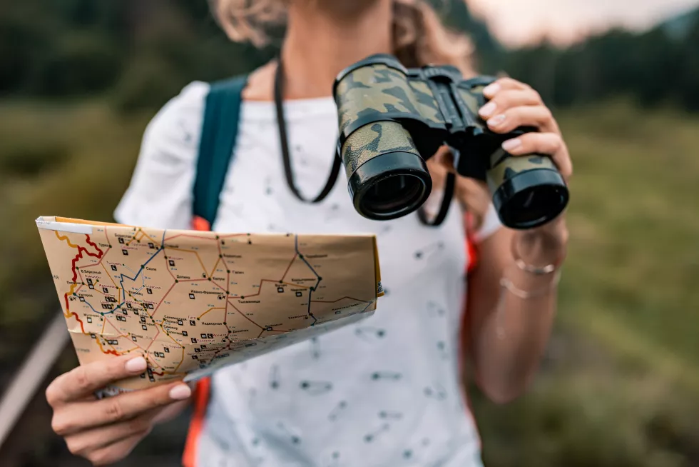 young-traveler-woman-with-map-railway