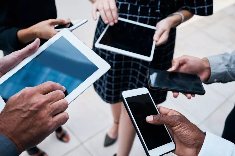 business-people-hands-mobile-group-with-screen-job-working-with-technology-meeting-team-tablet-phone-with-internet-collaboration-sales-strategy-together-teamwork