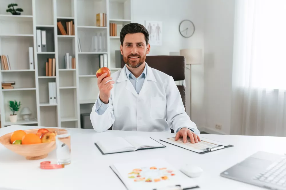 holding-apple-doctor-formal-clothes-is-working-cabinet