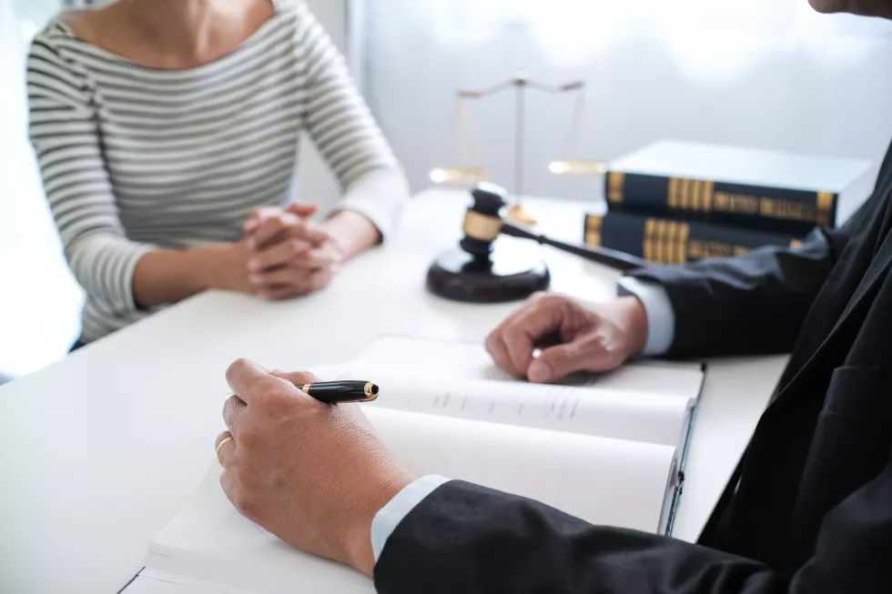 midsection-couple-holding-hands-table