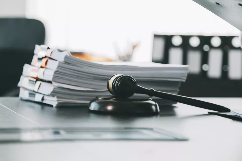 business-lawyers-discussing-contract-papers-with-brass-scale-desk-office-law-legal-services-advice-justice-law-concept-picture-with-film-grain-effect(4)