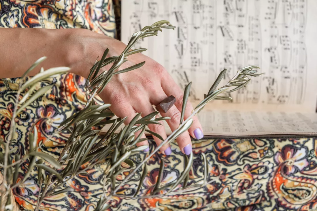 girl-hands-hold-piano-notes-selective-focus