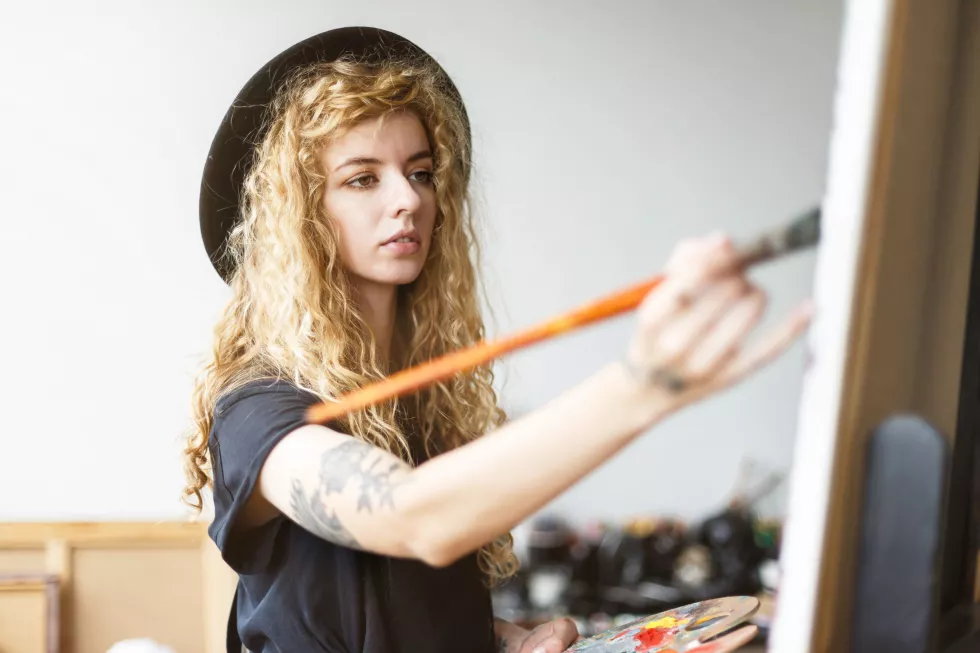 tattoed-female-curly-artist-black