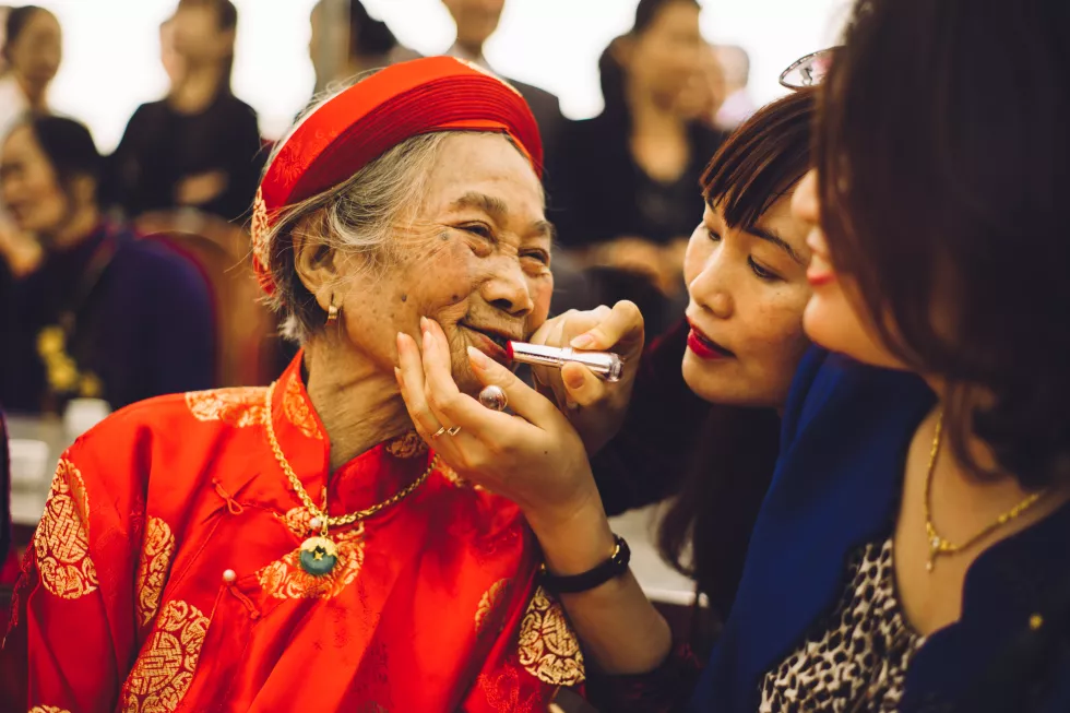 close-up-woman-applying-lipstick-mother-lips