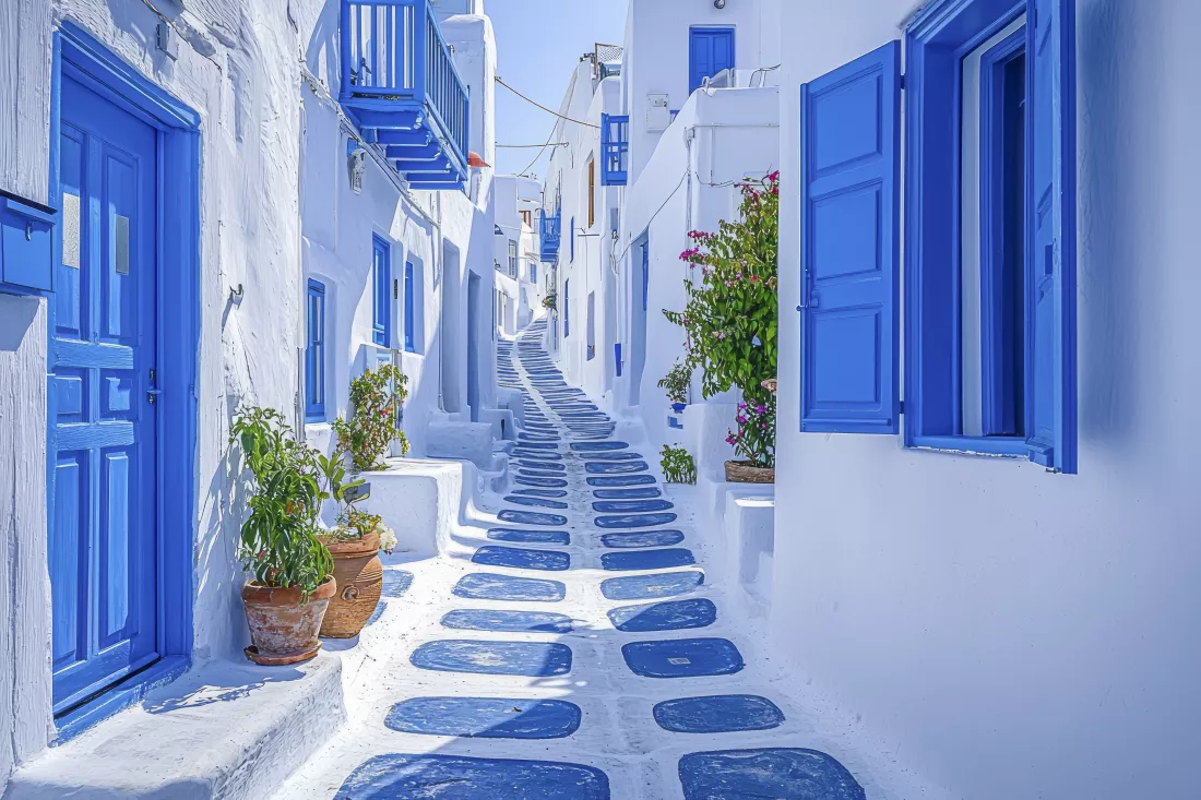 charming-greek-village-scene-quaint-blue-white-cobblestone-streets-with-traditional-houses-mykonos-island-greece