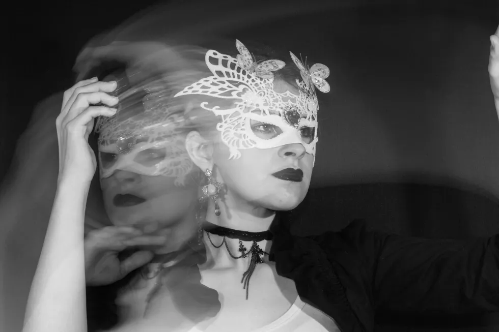 blurred-motion-young-woman-wearing-eye-mask