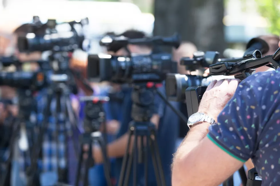 men-operating-camera-event