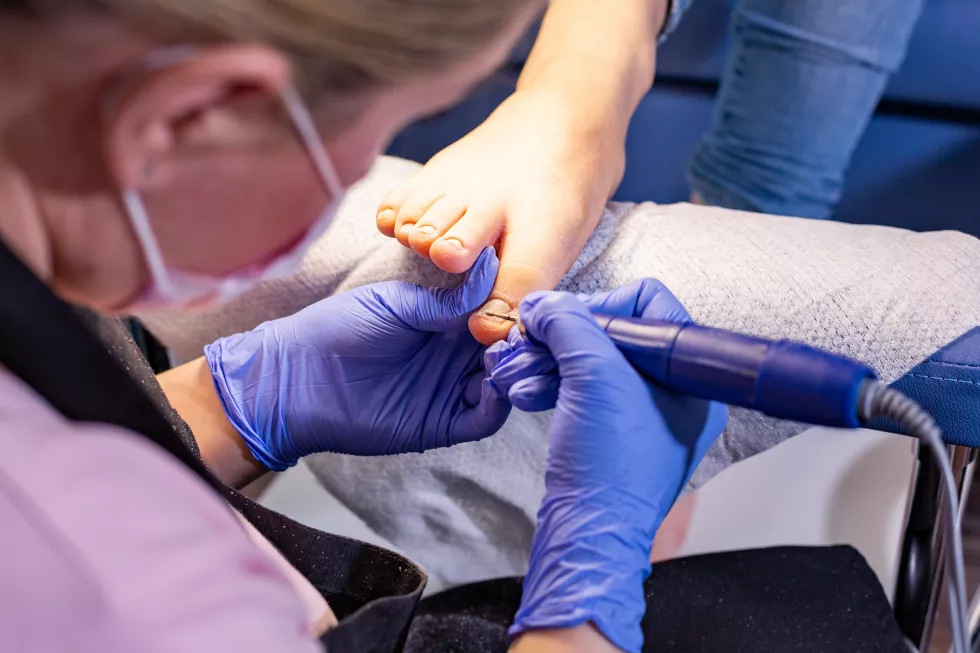 girl-does-manicure-manicure-beautiful-female-hands