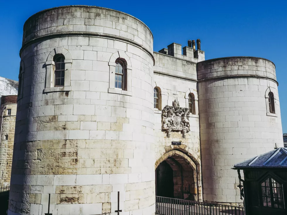 low-angle-view-historic-building-against-blue-sky
