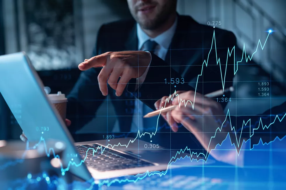 two-colleagues-formal-wear-working-together-optimize-trading-strategy-corporate-finance-fund-forex-chart-hologram-modern-office-background