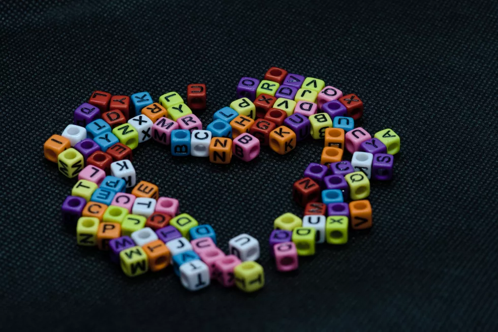 high-angle-view-multi-colored-toy-blocks-table