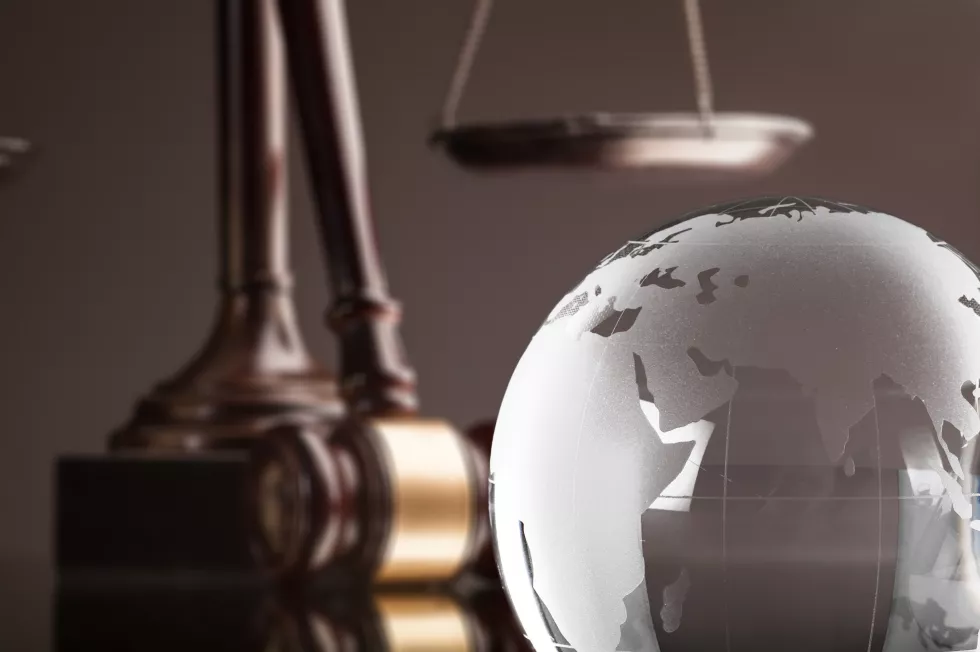 international-law-concept-world-globe-scales