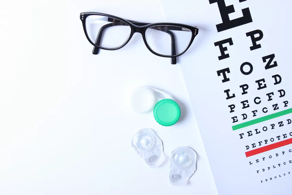 table-checking-vision-glasses-lenses-correcting-vision