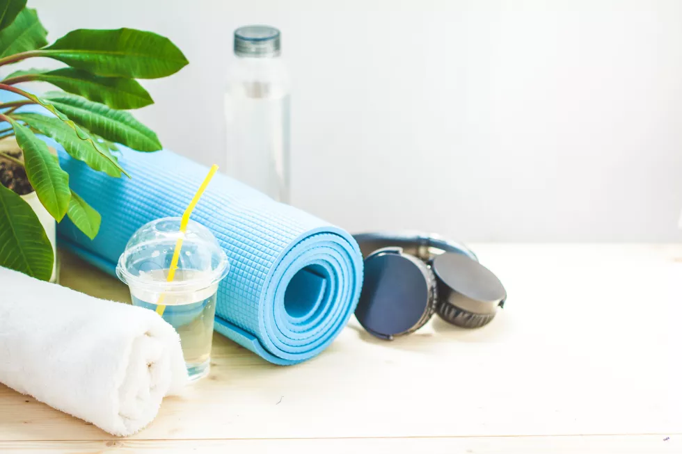 set-sports-blue-yoga-mat-towel-headphones-bottle-water-light