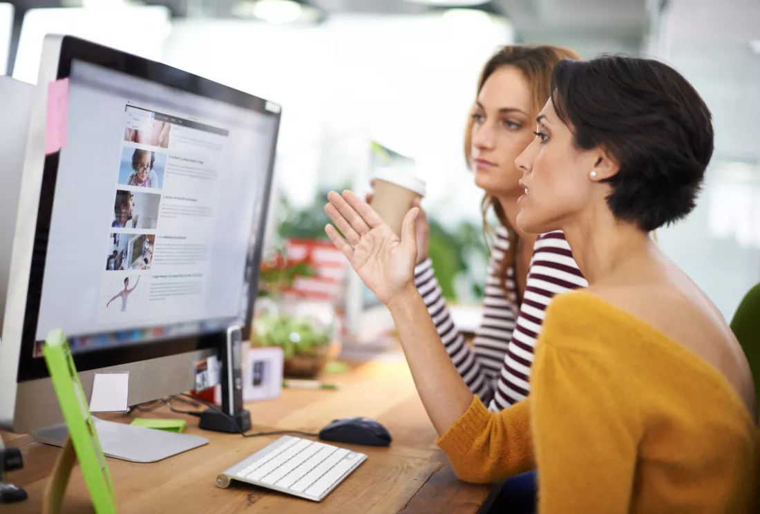 this-design-looks-promising-cropped-view-two-young-designers-working-computers