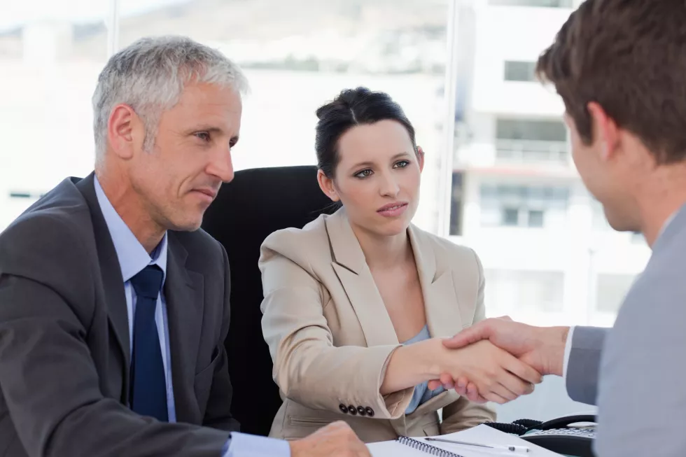 serious-business-team-concluding-agreement-with-customer