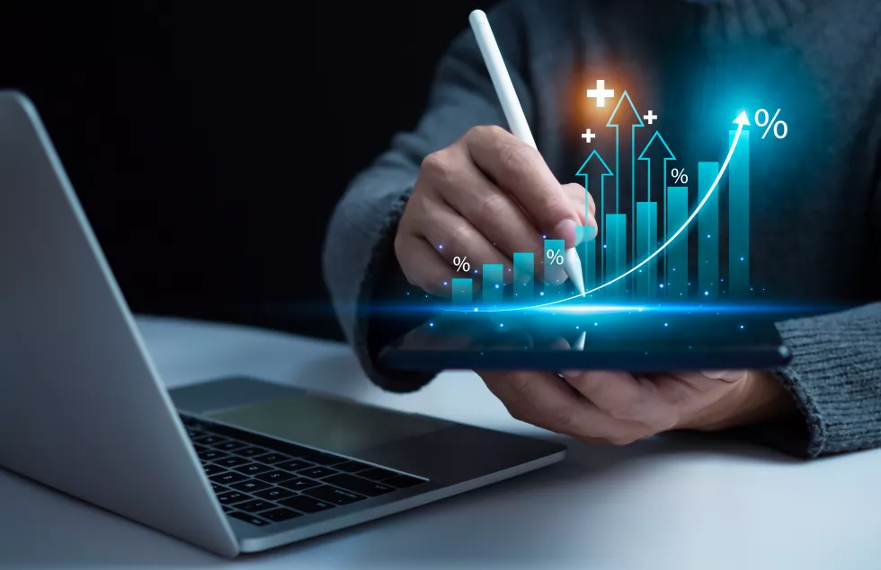 stock-market-business-growth-progress-success-concept-businessman-trader-is-showing-growing-virtual-hologram-stock-invest-trading