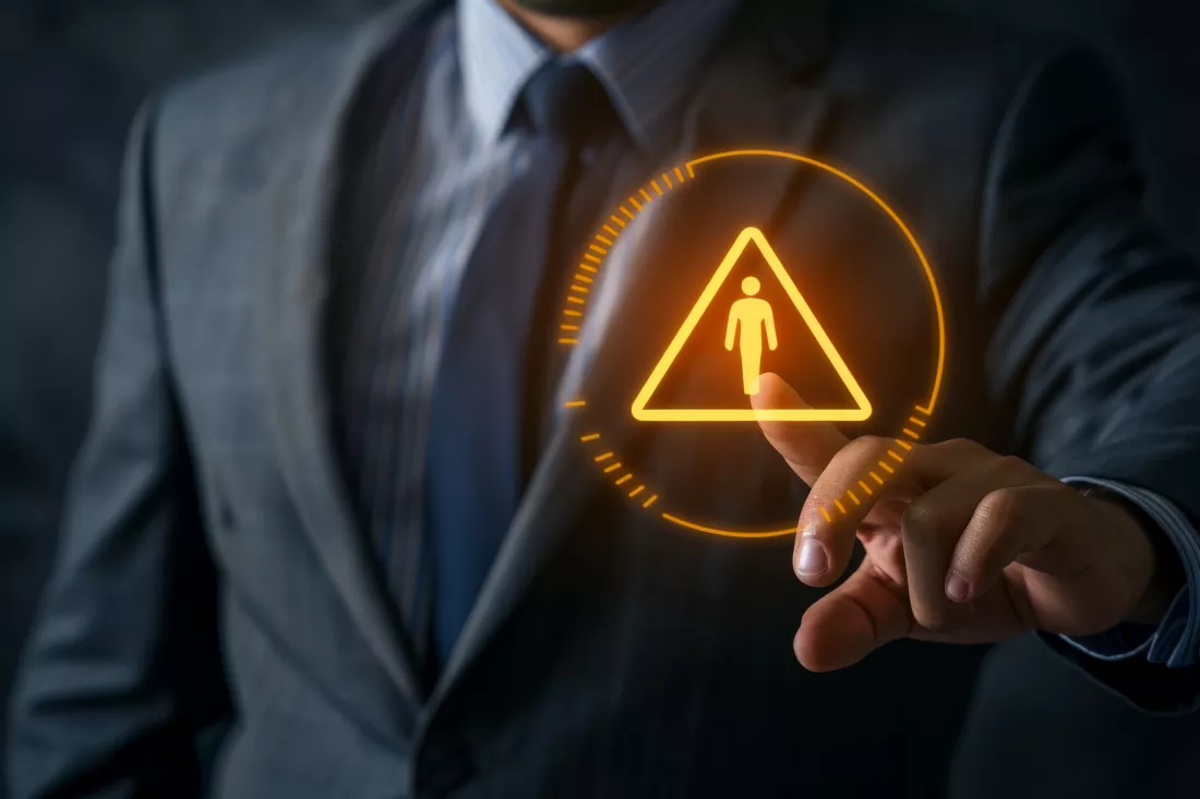 businessman-touching-warning-sign-icon-virtual-screen-business-background-growth-success