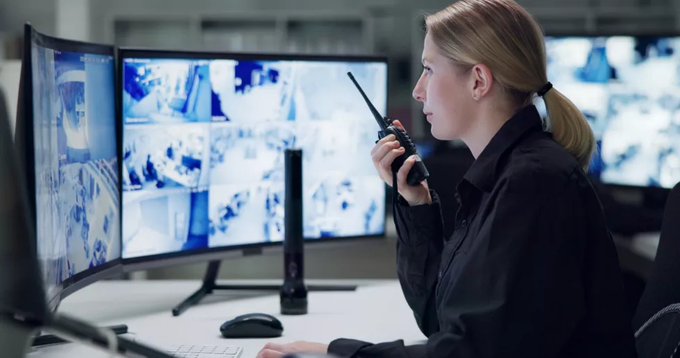 watch-security-woman-with-radio-cctv-monitor-danger-talking-control-room-guard-desk-night-working-protection-safety-communication-backup-connection