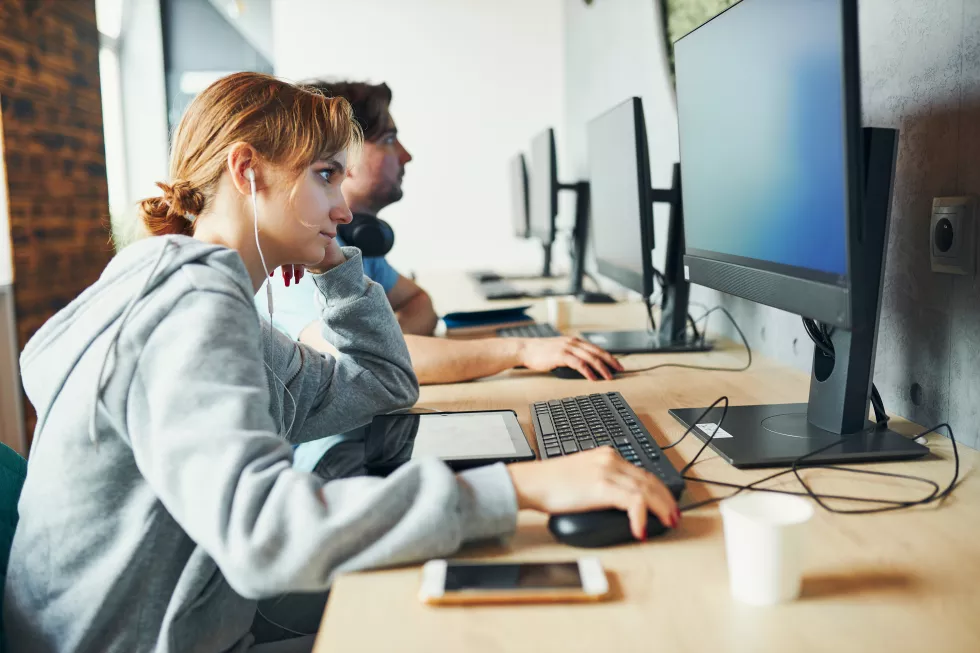 students-learning-computer-classroom-young-man-preparing-test-computer-back-school