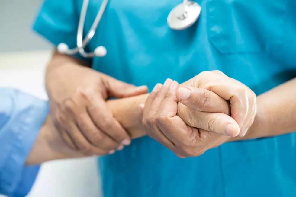 doctor-holding-touching-hands-asian-senior-woman-patient-with-love