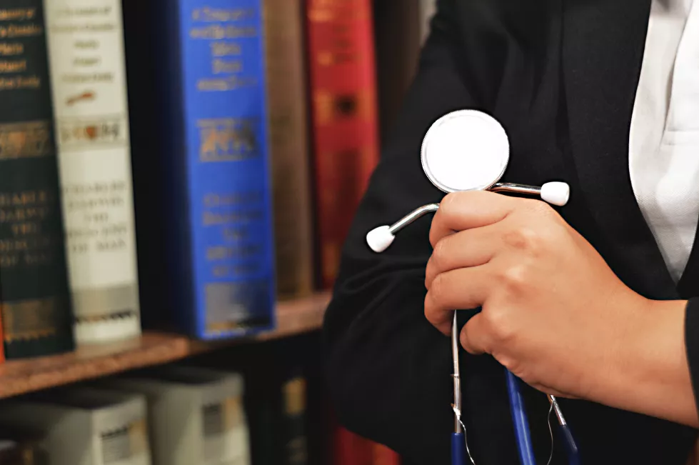 midsection-doctor-holding-stethoscope