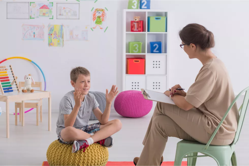 child-sits-stool-with-sign-that-says-number-2-it(1)