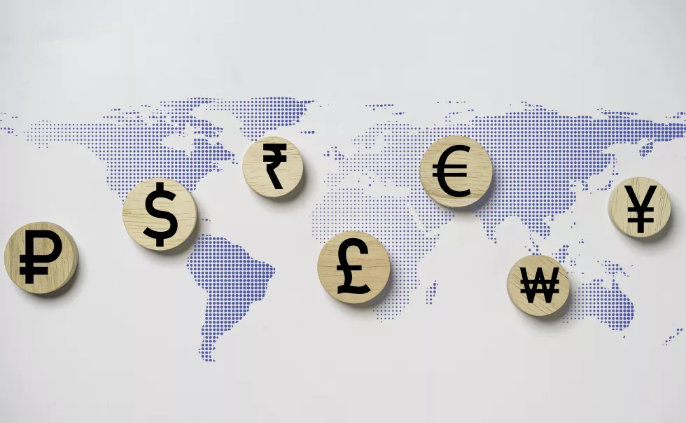 currency-sign-include-dollar-yuan-yen-euro-ruble-rupee-pound-sterling-print-screen-wooden-with-dot-world-map-money-exchange-transfer-forex-trading-concept