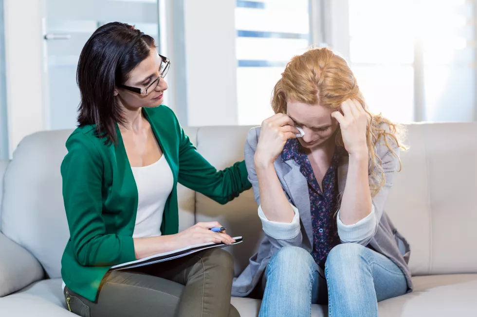 psychologist-comforting-depressed-patient