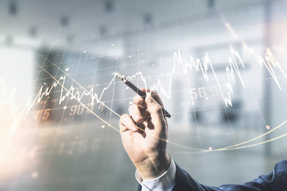 multi-exposure-analyst-hand-with-pen-working-with-virtual-abstract-financial-diagram-blurred-office-background-banking-accounting-concept