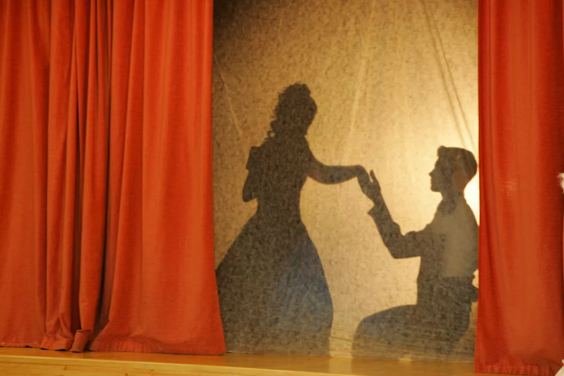 man-woman-silhouettes-medieval-clothes-fabric-against-light-background-love-concept