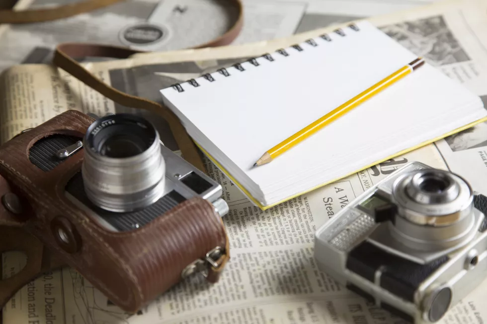 close-up-camera-book-table