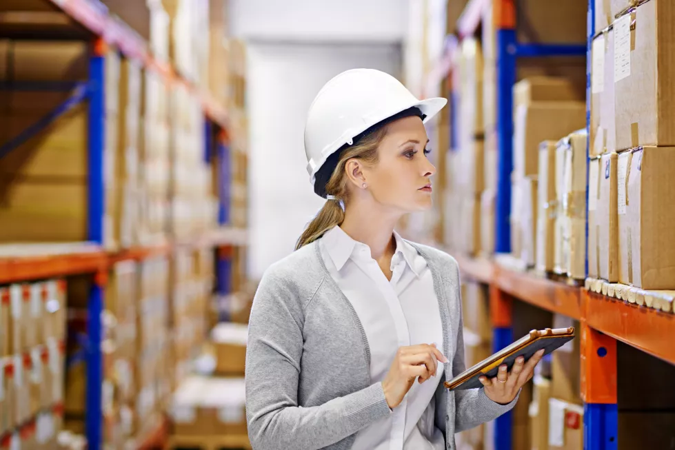 woman-tablet-taking-inventory-logistics-warehouse-package-distribution-delivery-stock-female-inspector-person-digital-device-hard-hat-commercial-shipping-industry