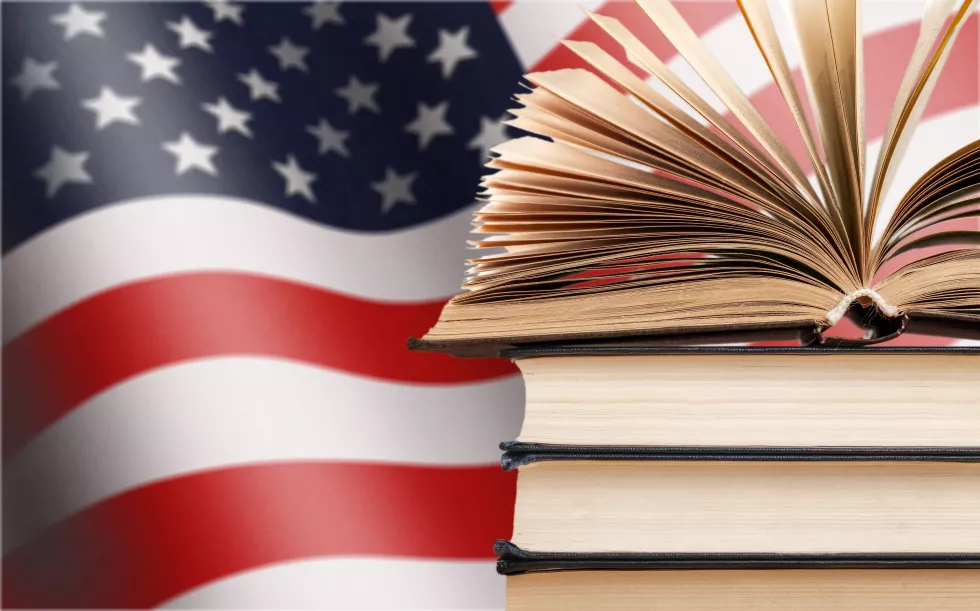 old-open-book-american-flag-background