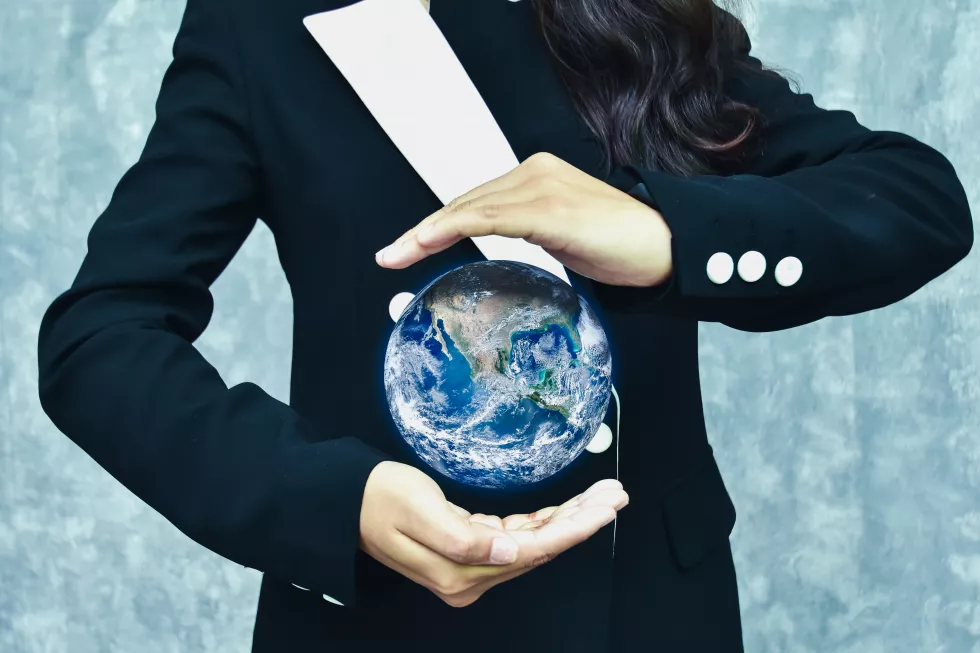 digital-composite-image-woman-protecting-earth