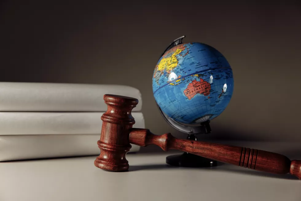 wooden-gavel-globe-desk-international-law-justice-court-concept(1)