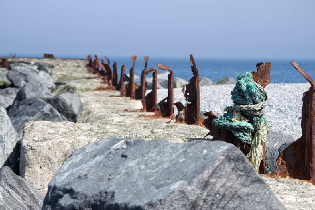 rocks-beach-against-clear-sky
