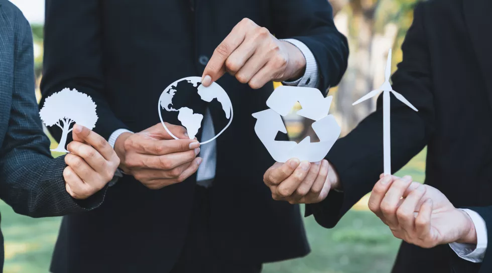business-people-holding-eco-alternative-energy-recycle-icon-gyre