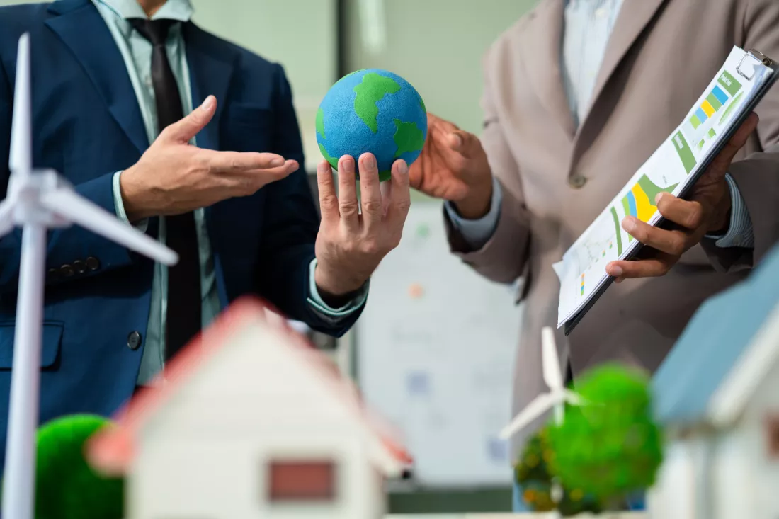businessman-team-brainstorming-using-tablet-laptop-computer-working-technology-business-renewable-energybased-green-businesses-global-warming-reduce-co2-emission