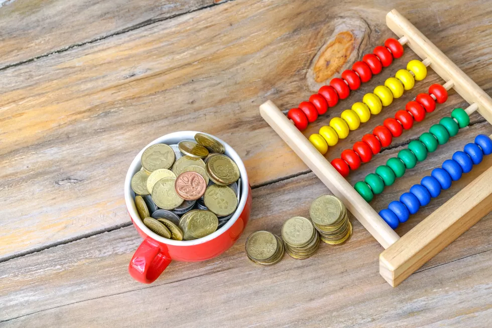 high-angle-view-coins-table-3