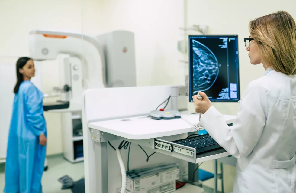 young-woman-is-having-mammography-examination-hospital-private-clinic-with-professional-female-doctor