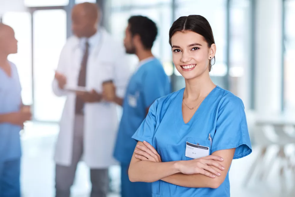 arms-crossed-healthcare-portrait-happy-woman-hospital-with-team-service-you-can-trust-confident-medical-smile-with-proud-professional-nurse-clinic-integrity-treatment