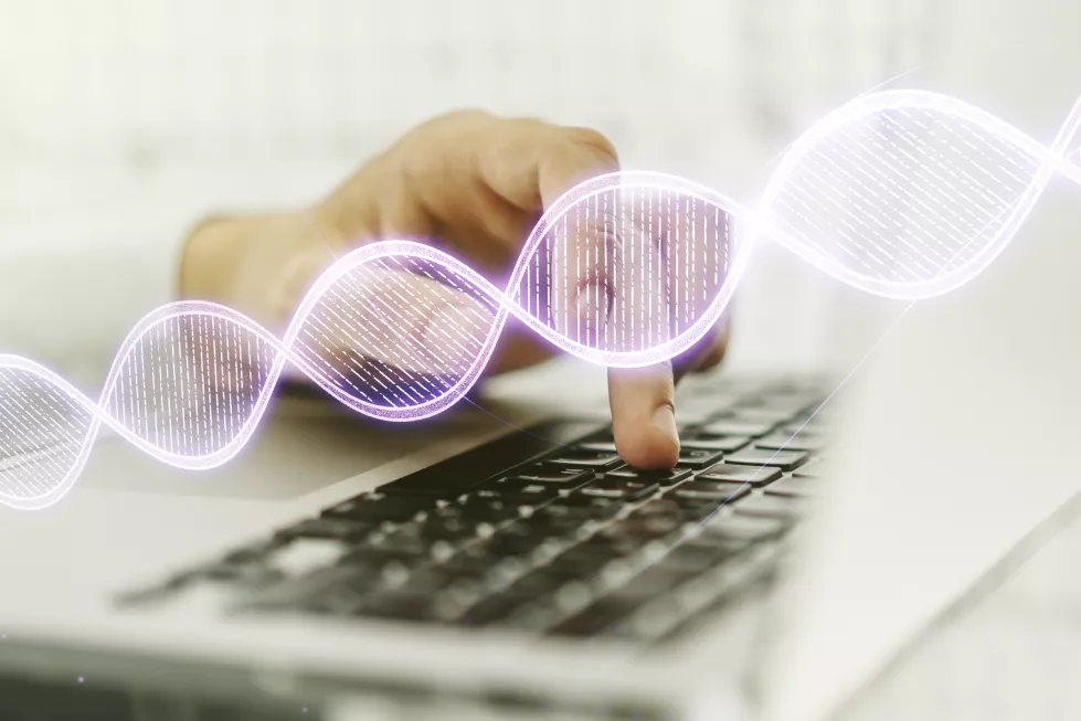 double-exposure-creative-dna-hologram-hands-typing-laptop-background-bio-engineering-dna-research-concept
