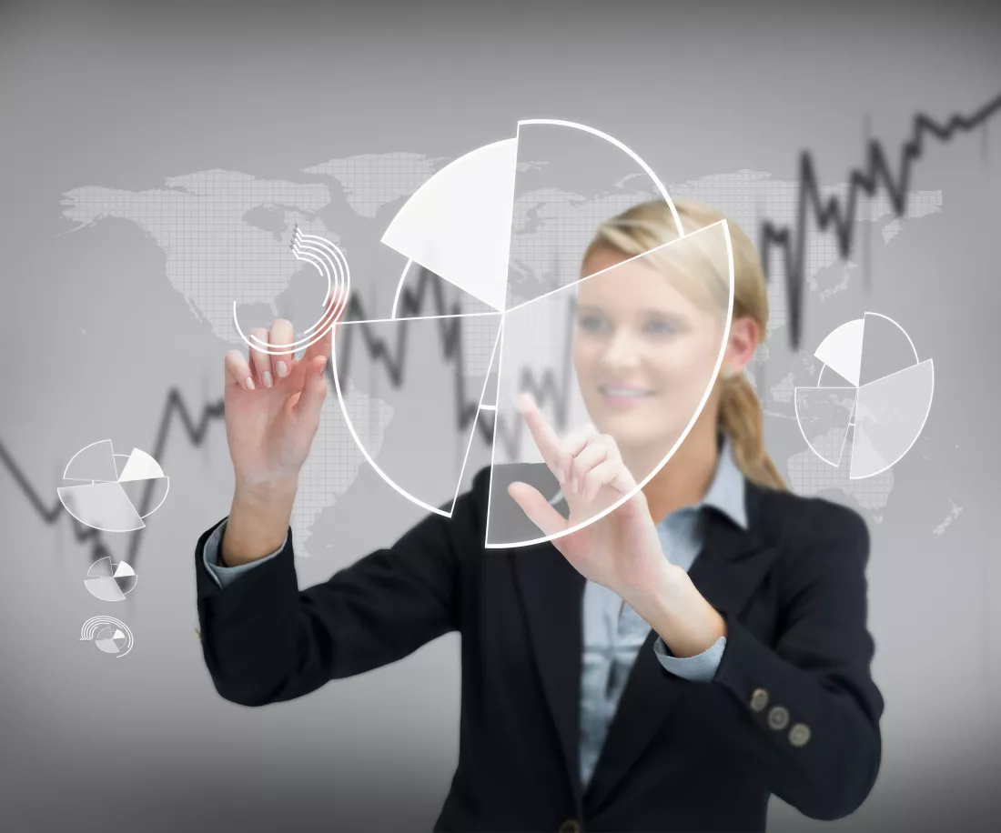 businesswoman-using-graphical-presentation-touch-screen