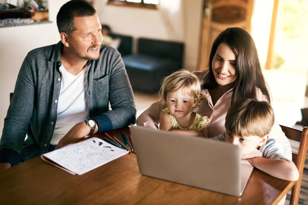 play-entertainment-learning-all-one-shot-adorable-brother-sister-using-laptop-with-their-mother-home