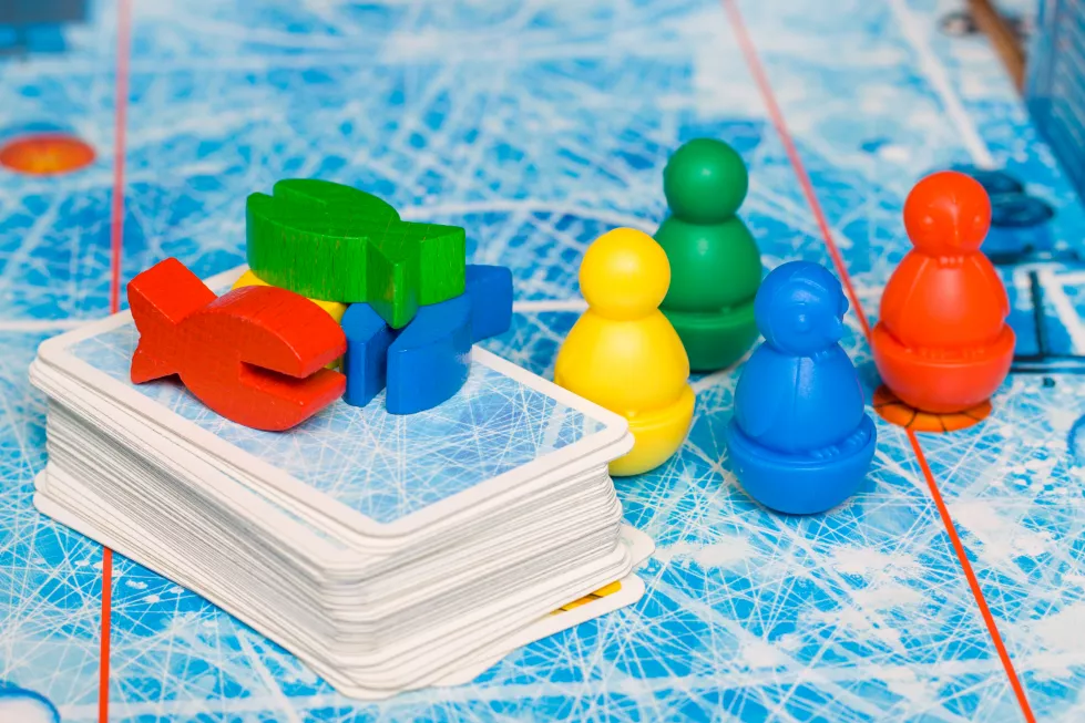 board-game-kids-leisure-concept-red-yellow-blue-green-wood-chips-figure-playi