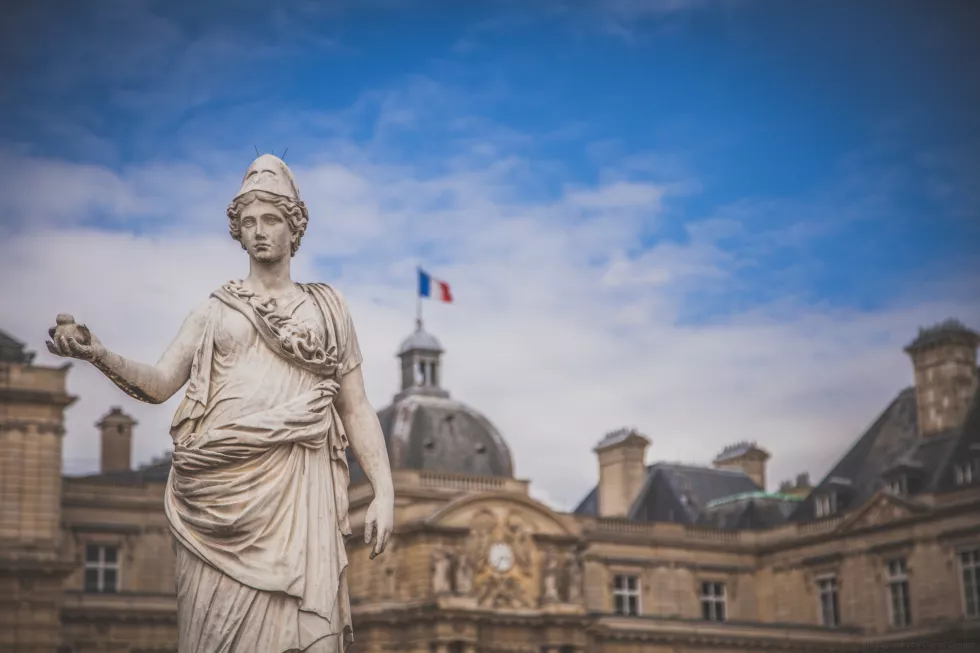 low-angle-view-statue-against-cloudy-sky