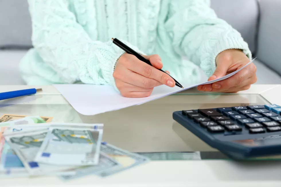 accounting-conceptanalyzing-finance-report-with-calculator