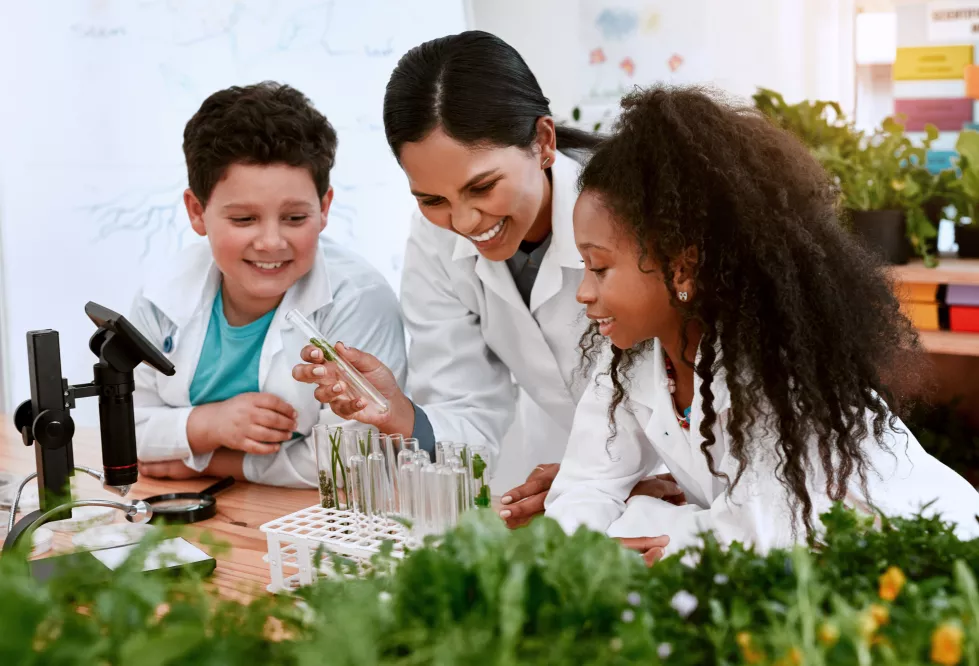 children-teacher-school-with-plants-classroom-education-science-environmental-awareness-people-students-happy-with-test-tube-crop-experiment-research-knowledge-lab