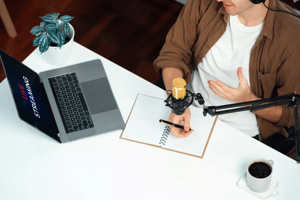 influencer-using-headphone-talking-with-listeners-social-media-gusher